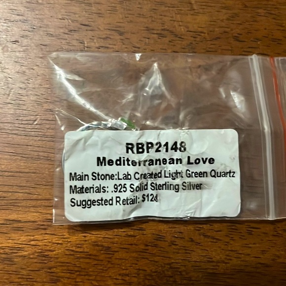 Brand NEW 925 Sterling Silver with Lab Created Light Green Quartz in size 9. - Picture 5 of 6